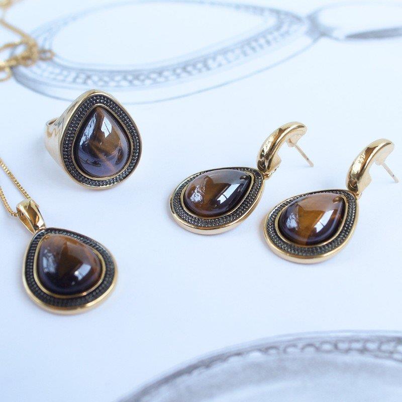 ANEL FOLHEADO A OURO E RÓDIO NEGRO COM EFEITO PEROLADO