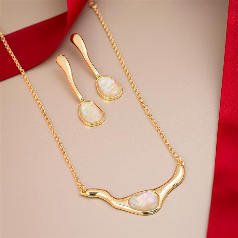 CONJUNTO FOLHEADO A OURO