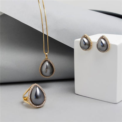 Conjunto Brilhato folheado a ouro com pérolas shell — Coleção Pérolas, referência 030250502