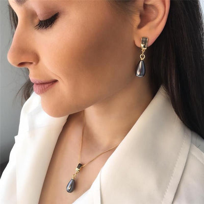 Conjunto Brilhato folheado a ouro com ródio negro e pérolas shell — referência 031256881